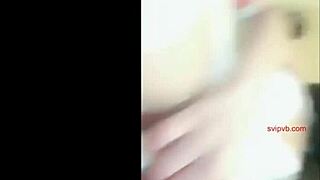 Intriguing Asian cam girl performs online