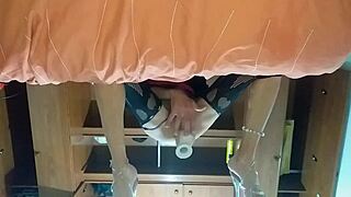 Latina travesti plunges her new toy deep into her tight backside.