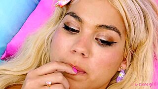 adorable blonde naked, showing off close-up on the sofa