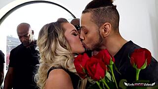A blonde adult film star gets to work on five big black cocks