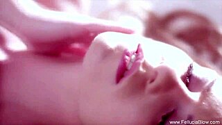 Stunning redhead delivers slow, sensual blowjob with artistic flair.