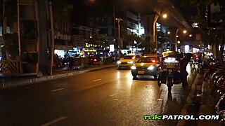 A young Filipino woman gives a blowjob to a tourist in a tuk tuk