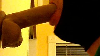 Gay Guy in Hood Deepthroats Dildo with Intense Action