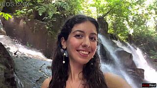 Crazy cumwalk splashing across a public waterfall