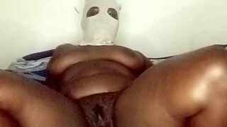 A petite girl with a big clit has a solo pleasure time