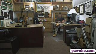 The wife of a customer has sex with the pawn shop clerk in the back room