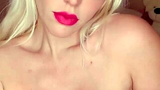 blondie fesser oils her ass and plays naked with pussy in pink lingerie, slapping huge tits for orgasm