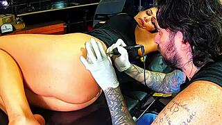 Wow, This Brunette Milf Drives the Tattoo Artist Crazy!