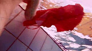 Avenna’s naked body glides through the water in the pool