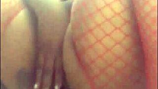 Squirting Whore Drenching Herself with Toys in Fishnets at Home