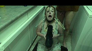Beautiful woman enjoys licking boots and drinking cum in a BDSM scene
