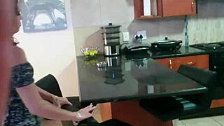 MILF gets upskirt surprise kitchen