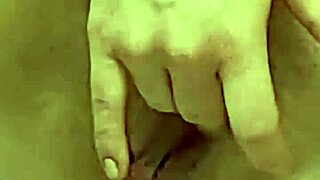 Young woman with big boobs masturbates and achieves orgasm