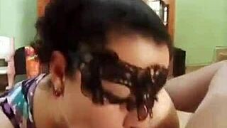 Watch her give a masked deepthroat blowjob.