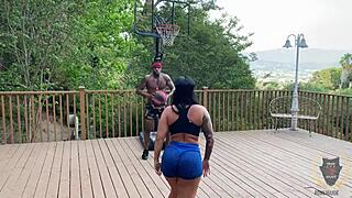 Basketball game heats up as Rome Major drills Monica Santhiago with deep thrusts.