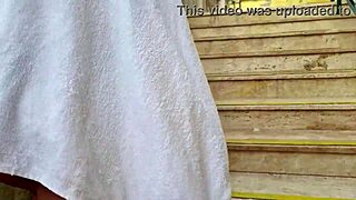 Teen relaxes in Budapest public pool with friends