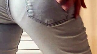 Petite blonde in tight jeans shows her cooleyhoppers in a homemade video