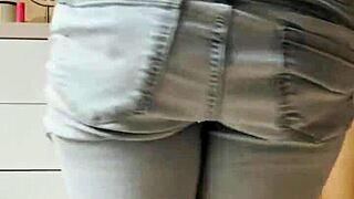 Petite blonde in tight jeans shows her cooleyhoppers in a homemade video