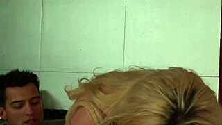 A blonde woman with a small bust is riding a man's dick