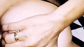 A wife in fishnet bodysuit poses beautifully