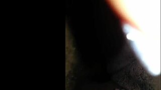 Black couple shares private intimate moments closeup