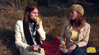 Two Brunettes Share Intimate Moments with Strapon During Outdoor Hike