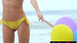 Skinny Italian milf blondie plays with balloons on the beach