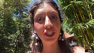 in the public locker room, she gets cum on her face, then walks to the waterfall with it