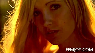 corinna, the busty blonde teen, poses nude at sunset