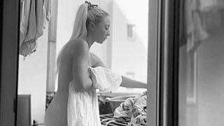 I'm hanging laundry naked on the balcony for neighbors to watch