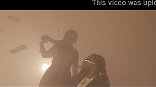 Damedot performs striptease with ripped clothes to music video