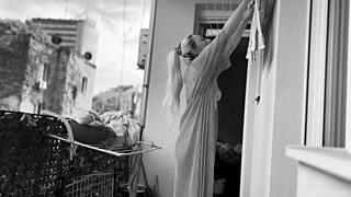 I'm hanging laundry naked on the balcony for neighbors to watch