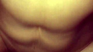 Old Wife Enjoys Sitting Comfortably on the Couch