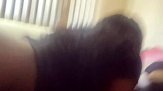 I'm having sneaky phone sex, bent over in doggystyle, moaning as he fucks my big ass