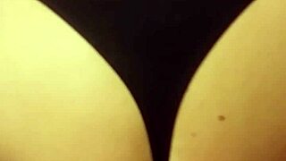 In this amateur scene, a wife gets a cumshot right on her ass, the hot load dripping down as she moans in pleasure.