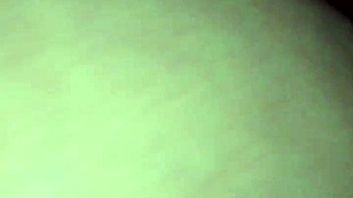 Exploring intimate moments with a partner using toys.