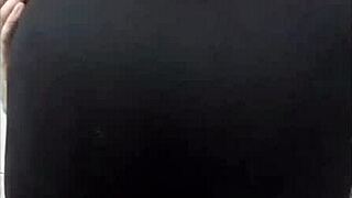 Undressing Doña Mary in her room as her husband leaves.