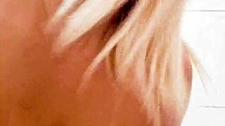Blonde MILF toys her pussy solo in the bathroom