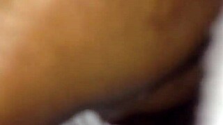 Exploring intimate moments with a partner using toys.