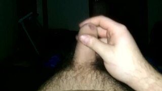 Watch this uncut cock being masturbated until it cums hard