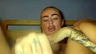 i watched this tattooed goth slut finger herself raw