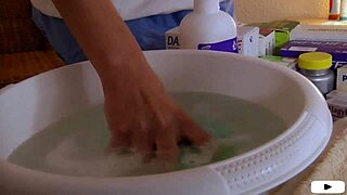 Gentle French Nurse Cares For Elderly Patient In Hospital Ward