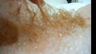 Annie bathes her big tits in the tub