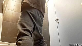 sexy bodybuilder masturbates big cock riskily in public bathroom