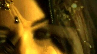 beautiful indian brunette performs erotic striptease by undressing and ripping clothes nude on stage