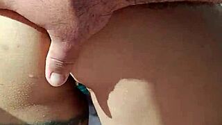 Check out the prostitute flashing her tattooed ass outdoors