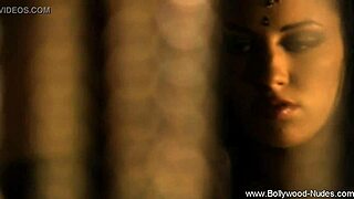 beautiful indian brunette performs erotic striptease by undressing and ripping clothes nude on stage