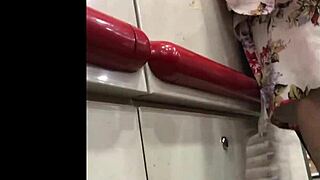 I spy on the hot granny in her skirt at the shop, upskirt view