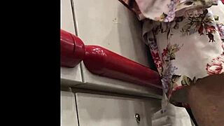 I spy on the hot granny in her skirt at the shop, upskirt view