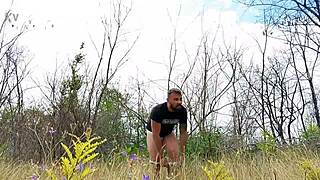 Handsome man walks naked in the public park, showing off his body